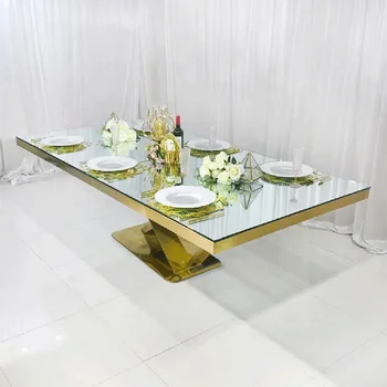 современный дизайн, зеркальная стеклянная столешница, рама из нержавеющей стали, свадебная вечеринка, золотой обеденный стол в отеле